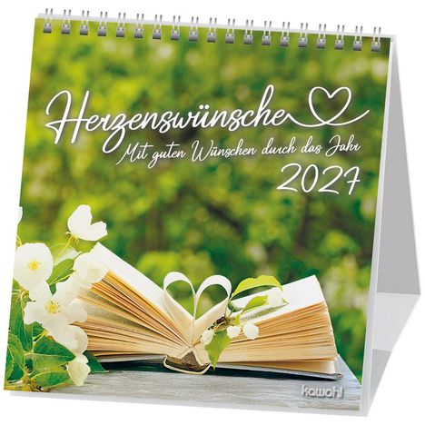 "Herzenswünsche - Mit guten Wünschen durch das Jahr 2024". Ein aufgeklapptes Buch mit Herzform, umgeben von weißen Blüten.