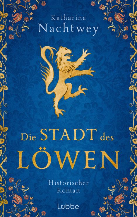 Text: Katharina Nachtwey, Die Stadt des Löwen, Historischer Roman, Lübbe. Blaue Abdeckung mit goldenen Verzierungen und Löwe.
