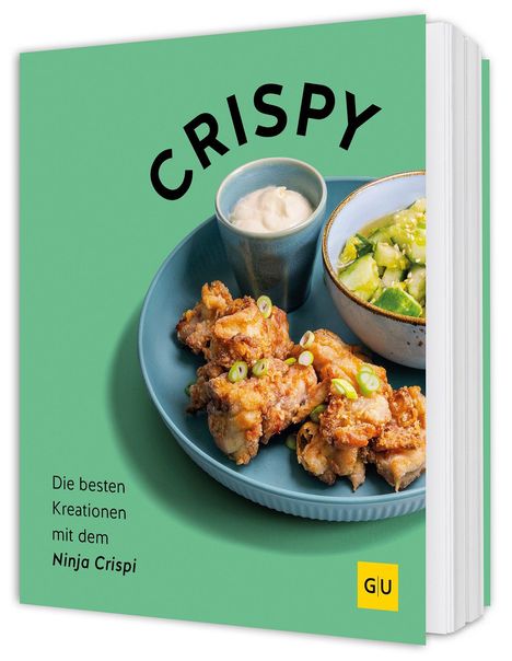 "Crispy. Die besten Kreationen mit dem Ninja Crispi." Gezeigt werden knusprige Hähnchenstücke auf einem Teller.