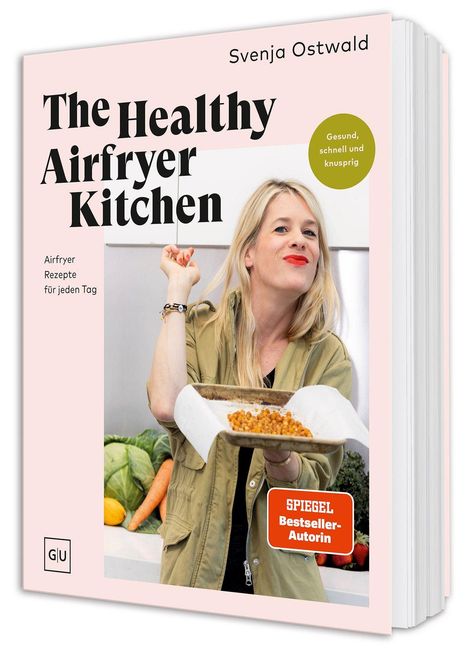 Buchtitel "The Healthy Airfryer Kitchen". Eine Frau präsentiert ein Blech mit gebackenen Kichererbsen.