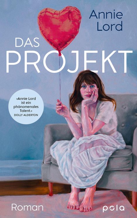 Texte: "Annie Lord, DAS PROJEKT, Annie Lord ist ein phänomenales Talent. DOLLY ALDERTON, Roman, pola."  
Illustration: Frau hält Herzluftballon, sitzt nachdenklich.