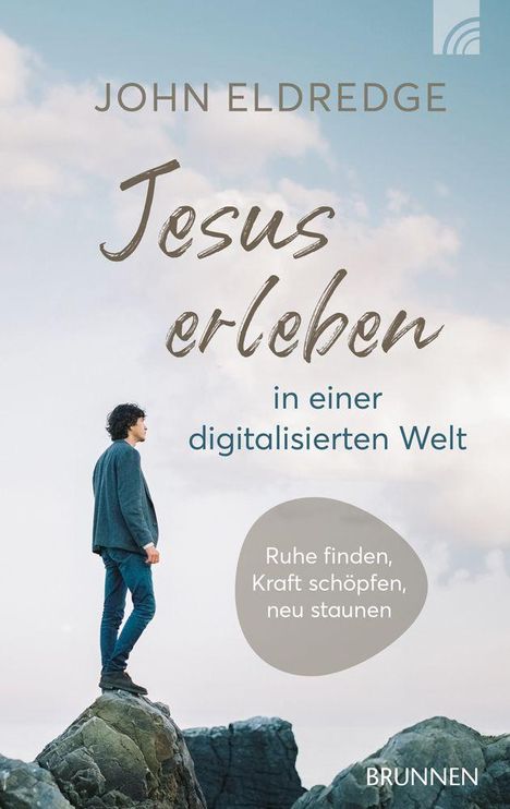 Text: "John Eldredge, Jesus erleben in einer digitalisierten Welt. Ruhe finden, Kraft schöpfen, neu staunen." Ein Mann steht auf einem Felsen.