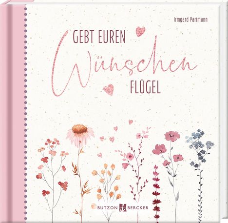 „Gebt euren Wünschen Flügel.“ Bunte Blumenillustrationen verzieren die Szenerie. Autorin: Irmgard Partmann.