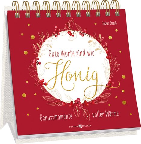 "Gute Worte sind wie Honig. Genussmomente voller Wärme." Roter Hintergrund mit Blumenkranz und goldenen Akzenten.