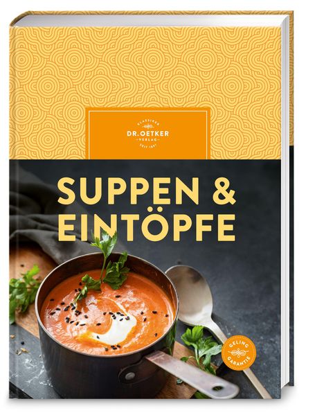 „SUPPEN & EINTÖPFE“ steht groß auf einem Buch. Ein Topf mit tomatiger Suppe und Kräutern ist abgebildet.