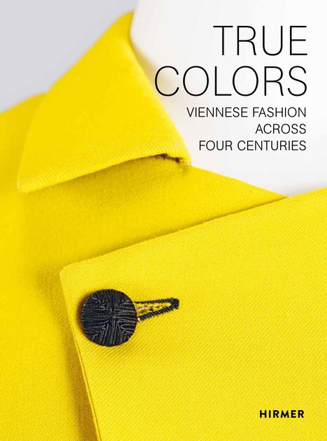 Text oben: "TRUE COLORS VIENNESE FASHION ACROSS FOUR CENTURIES". Gelber Kragen mit schwarzem Knopf.