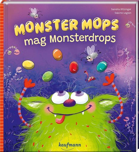 „MONSTER MOPS mag Monsterdrops“, fröhliches, grünes Monster mit großen Augen, bunte Drops und zwei Fliegen.