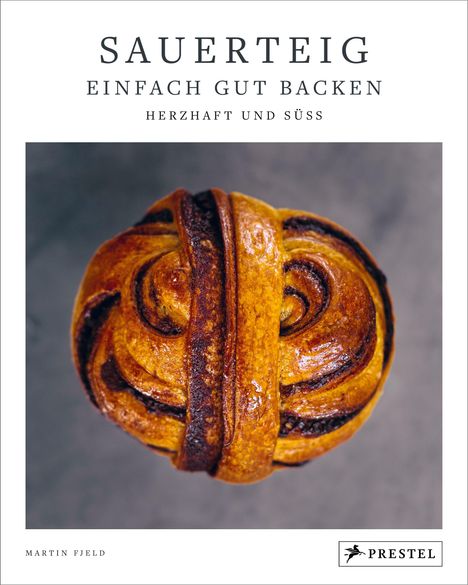 "Sauerteig: Einfach gut backen, herzhaft und süß." Foto eines kunstvoll geformten, glasierten Brotes. Autor: Martin Fjeld.