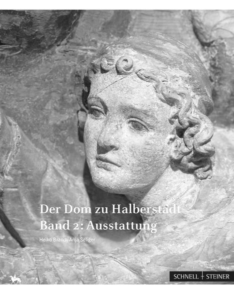 "Der Dom zu Halberstadt, Band 2: Ausstattung." Darstellung eines steinernen Gesichts in Nahaufnahme.