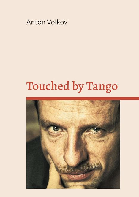 "Anton Volkov", "Touched by Tango", Foto eines nachdenklichen Mannes mit Bart und grünen Augen im mittleren Bereich.