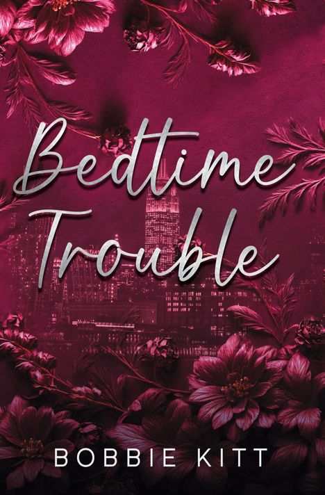 „Bedtime Trouble“ steht groß, darunter „BOBBIE KITT“. Dunkles Stadtpanorama mit floralen Mustern in Rot- und Violetttönen.
