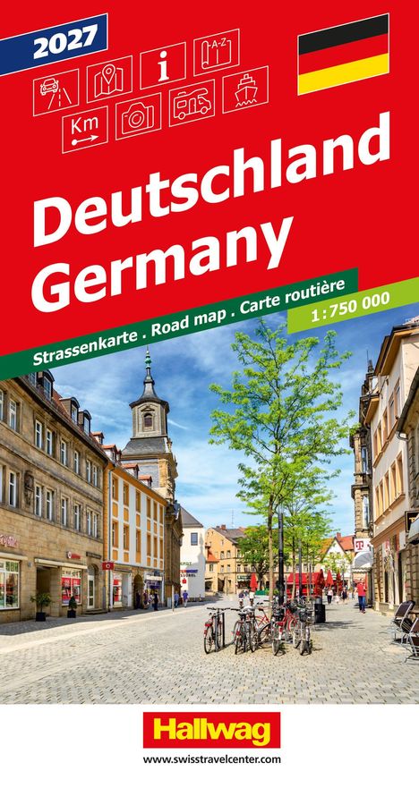Deutschland Germany, 2027, Straßenkarte, 1:750 000, Hallwag. Szene in einer gepflasterten Stadtstraße mit Fahrrädern.