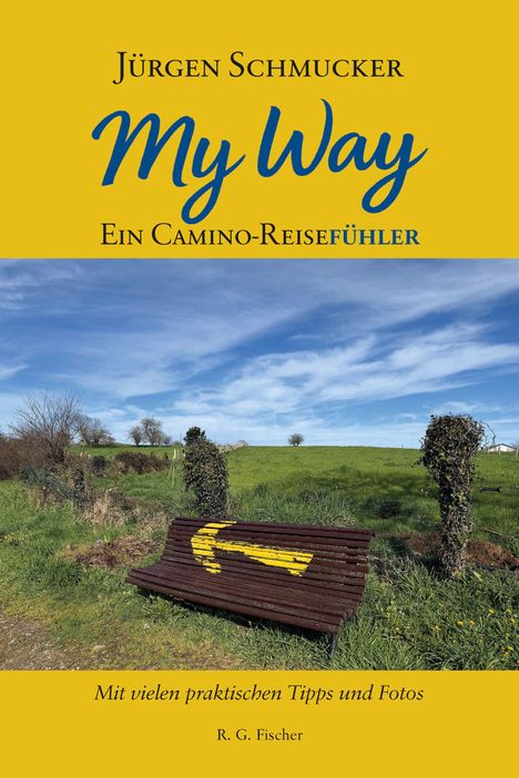 „Jürgen Schmucker: My Way – Ein Camino-Reiseführer.“ Eine Bank mit gelben Pfeil auf grünem Feld unter blauem Himmel.