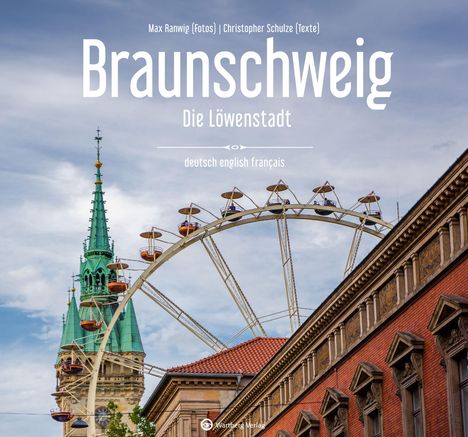 "Braunschweig - Die Löwenstadt" mit einem Kirchenkirchturm, einem Riesenrad und einem historischen Gebäude im Vordergrund.