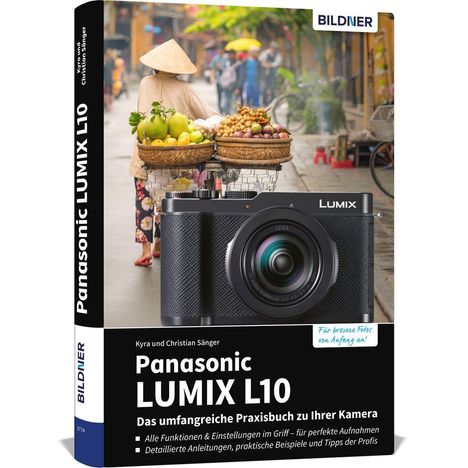 Panasonic LUMIX L10 Praxisbuch mit Kameraabbildung, Frau mit Früchten im Hintergrund.