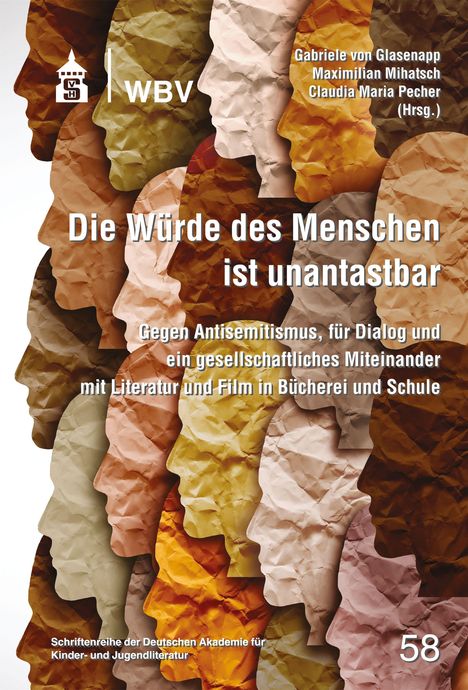 „Die Würde des Menschen ist unantastbar.“ Verschiedene bunte Papierprofile im Profil übereinander geschichtet.