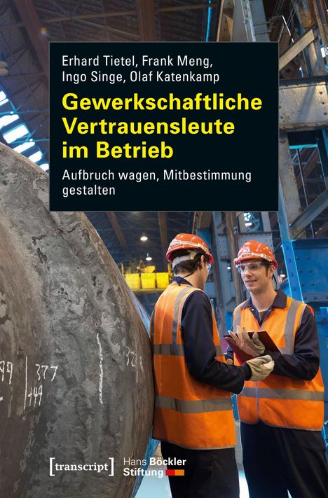 Titel: Gewerkschaftliche Vertrauensleute im Betrieb. Zwei Personen in Schutzkleidung sprechen in einer Fabrikhalle.