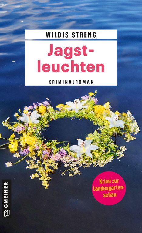 "Jagstleuchten" in großen roten Buchstaben. Ein Kranz aus bunten Blumen schwimmt auf blauem Wasser.