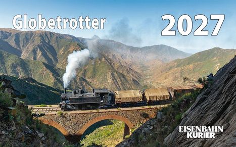 "Globetrotter 2027". Eine Dampflokomotive fährt über eine Brücke in einer gebirgigen Landschaft bei klarem Himmel.