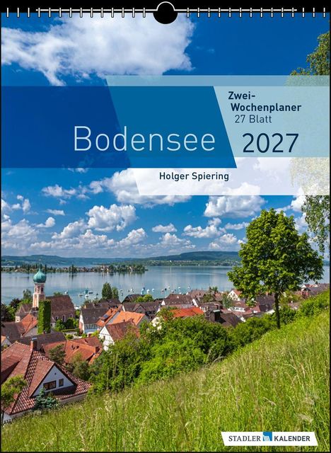 Zwei-Wochenplaner "Bodensee 2027" von Holger Spiering. Malerische Landschaft mit See, Himmel und Dorf.