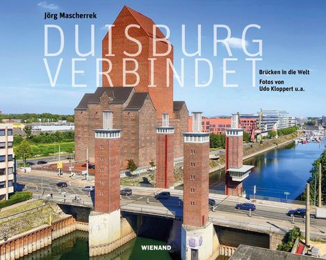 Texte: Duisburg verbindet. Jörg Mascherrek. Brücken in die Welt. Fotos von Udo Kloppert u.a. Wienand. 

Bild: Brücke mit Gebäuden am Wasser.