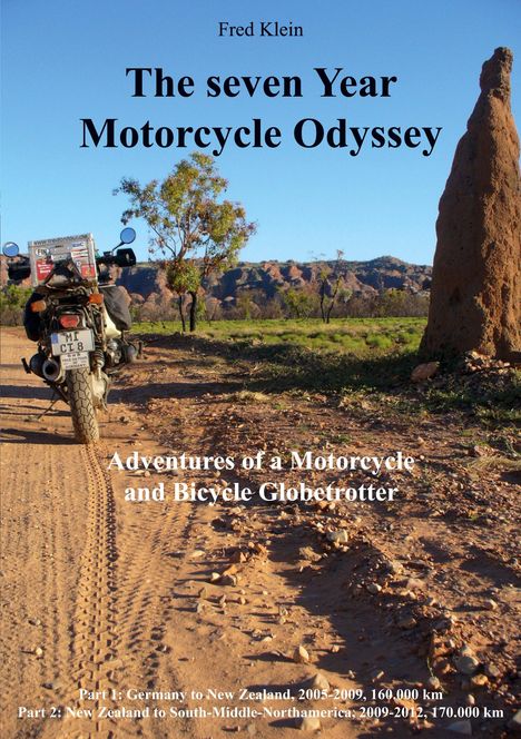 Text: "The seven Year Motorcycle Odyssey", "Adventures of a Motorcycle and Bicycle Globetrotter". Motorrad und Naturhintergrund.
