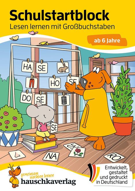 "Schulstartblock. Lesen lernen mit Großbuchstaben. Ab 6 Jahre." Illustration: Hund erklärt einer Maus Buchstaben.
