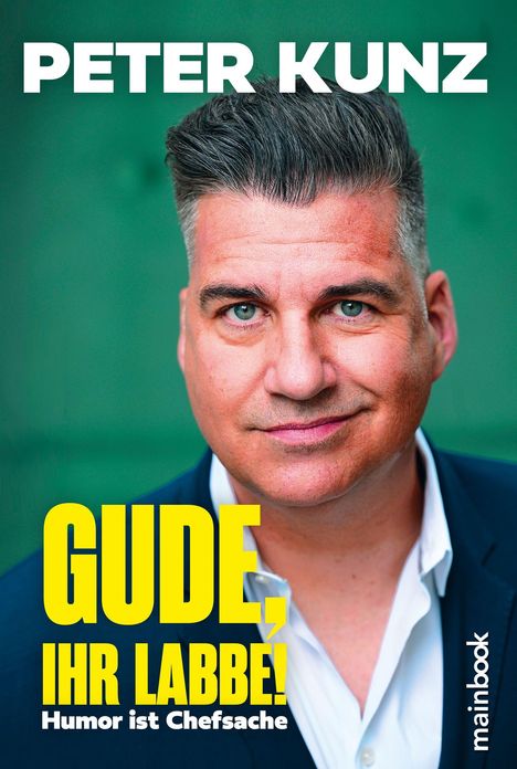 Texte: "PETER KUNZ", "GUDE, IHR LABBE!", "Humor ist Chefsache", "mainbook". Porträt eines Mannes vor grünem Hintergrund.