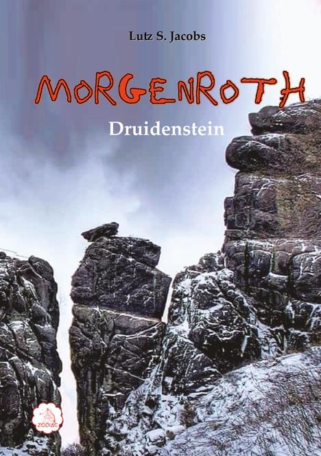 Text: "Lutz S. Jacobs", "Morgenroth", "Druidenstein".  
Schneebedeckte Felsen unter bewölktem Himmel.