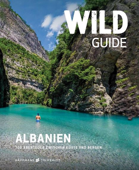 Text: "WILD GUIDE ALBANIEN 700 Abenteuer zwischen Küste und Bergen. Häffmans Tolkemitt." Blauer Fluss zwischen Bergen.