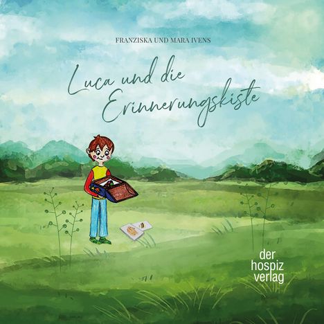 "Luca und die Erinnerungskiste". Illustration: Kind auf Wiese mit Kiste. Hintergrund: malerische Landschaft, "der hospiz verlag".
