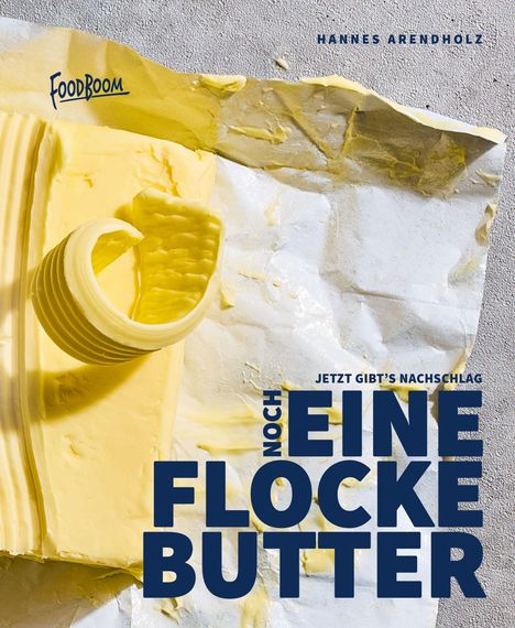 Text: "NOCH EINE FLOCKE BUTTER" und "JETZT GIBT'S NACHSCHLAG". Ein Stück Butter auf zerknülltem Papier.
