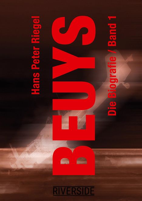 Text: "BEUYS", "Hans Peter Riegel", "Die Biografie / Band 1", "RIVERSIDE". Hintergrund in Braun mit abstraktem Muster.
