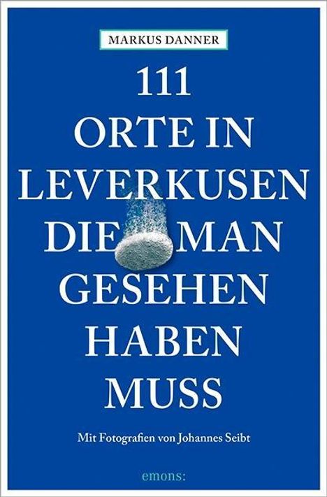"111 Orte in Leverkusen die man gesehen haben muss" steht in weiß auf blauem Hintergrund. Unten ist ein kleines Bild eines Brunnens.