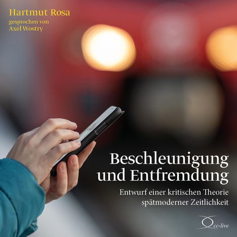Titel: "Beschleunigung und Entfremdung". Eine Hand hält ein Smartphone, Hintergrund unscharf.