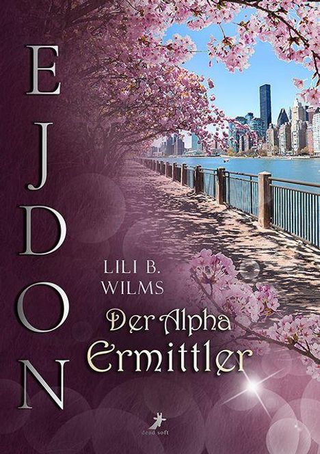„EJDON“, „LILI B. WILMS“, „Der Alpha Ermittler“. Kirschblütenweg an einem Fluss mit Stadt im Hintergrund.