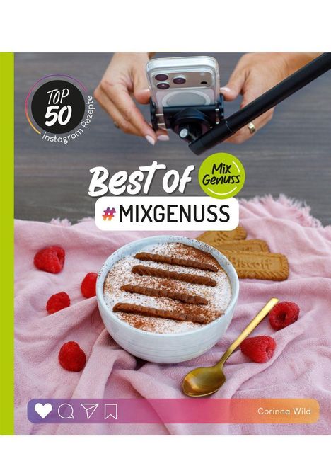 Best of #MixGenuss. Top 50 Instagram Rezepte. Eine Schüssel Dessert auf rosa Tuch mit Himbeeren und Keks.