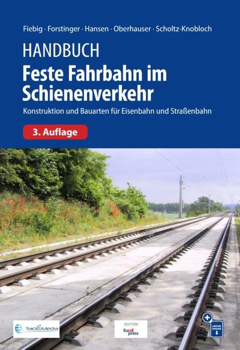 Handbuch „Feste Fahrbahn im Schienenverkehr“, 3. Auflage. Bahngleise führen entlang einer grünen Landschaft.