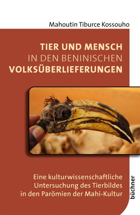 Titel: Tier und Mensch in den beninischen Volksüberlieferungen. Bild: Nahaufnahme eines Vogelschädels.