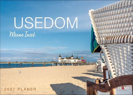 "USEDOM Meine Insel 2027 PLANER" steht im Bild. Sonnenbank am Sandstrand mit Blick auf eine Seebrücke und Pavillon.