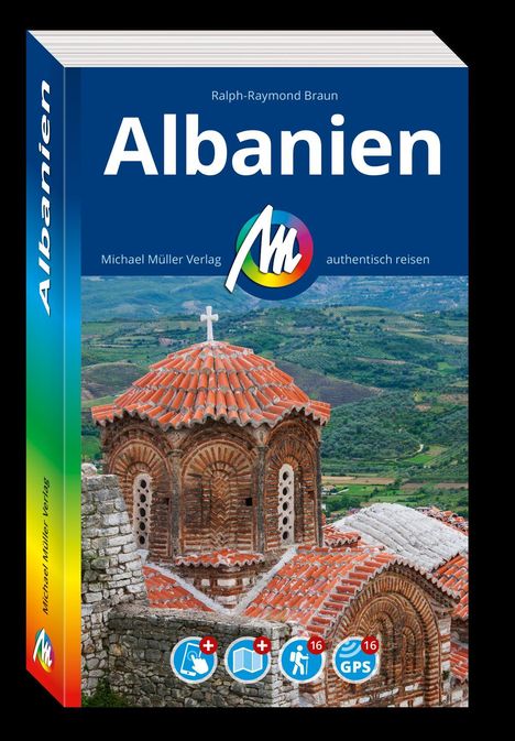 Titel „Albanien“ von Ralph-Raymond Braun. Im Hintergrund eine alte Kirche mit roten Ziegeldächern.