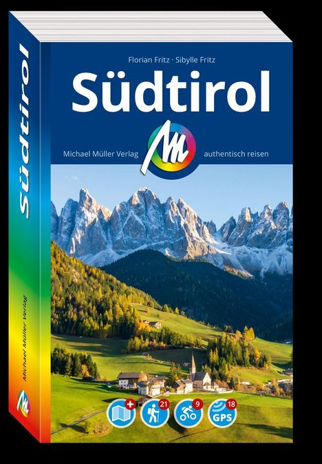 "Südtirol" von Florian und Sibylle Fritz. Michael Müller Verlag, authentisch reisen. Landschaft mit Dorf und Bergen im Hintergrund.