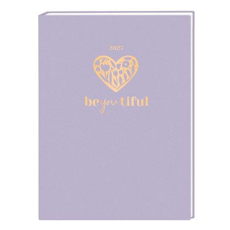 "2027, beyoutiful" in gold auf einem lila Notizbuch mit Herzmotivdesign.