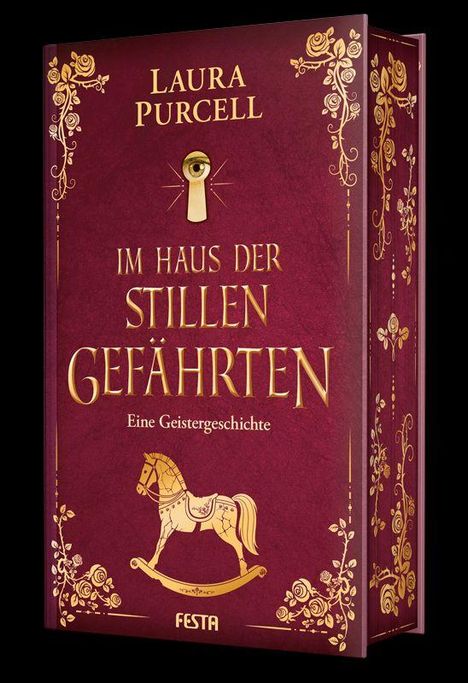 "Im Haus der stillen Gefährten" von Laura Purcell. Ein rotes Buch mit goldenen Verzierungen und einem Schaukelpferd.