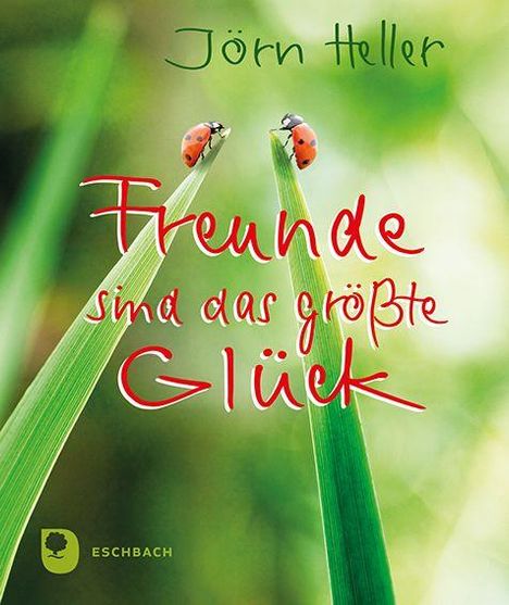 Text: "Jörn Heller. Freunde sind das größte Glück." Zwei Marienkäfer auf Gras, Hintergrund grün und unscharf. Logo unten.