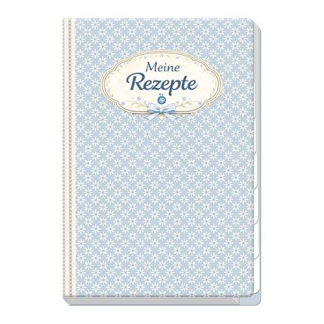 "Meine Rezepte" in einer eleganten Schrift, auf einem hellblauen Hintergrund mit weißen Blumenmotiven und Spitzenband.