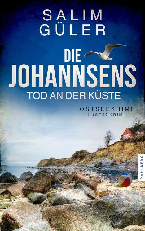 Text: "Salim Güler. Die Johannsens - Tod an der Küste. Ostseekrimi Küstenkrimi."

Küste mit Felsen, ein Strandball, Möwe.