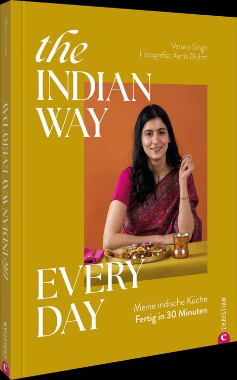 „the INDIAN WAY EVERY DAY, Meine indische Küche Fertig in 30 Minuten.“ Frau in Sari mit Thali-Gericht.