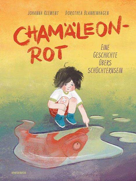 Text oben: "Chamäleon-Rot", darunter "Eine Geschichte übers Schüchternsein". Kind am Wasser mit rotem Chamäleon-Schatten.