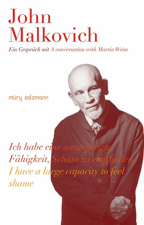 Buchtitel, roter Text: "John Malkovich". Schwarz-weiß Bild eines älteren Mannes mit ernstem Gesichtsausdruck.
